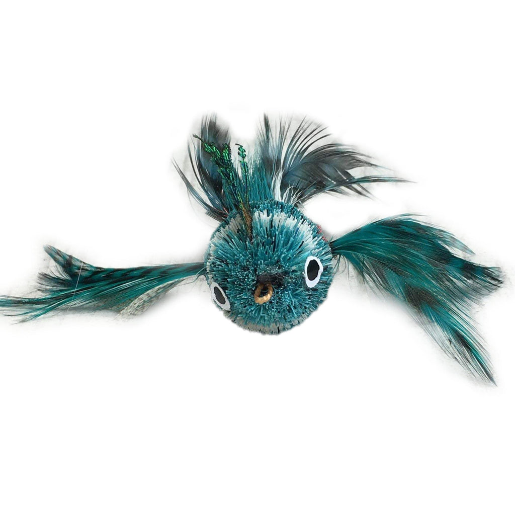 This is a Pretty Fly Bird Teaser Wand Cat Toy Replacement Lure by Catboutique. The bird is made from real deer hair and it gives a bristly hair appearance. It has bird feather for wings and a tail. There is a cotter ring clip where the beak should be. The bird is mostly turquoise with a white strip near the eyes. This lure is meant to engage at the cat's hunting instincts like prowling, pawing, and pouncing. The lure works best with a teaser wand cat toy.  