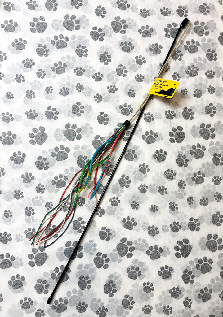 Photo of the The PURRfect® Wild Hemp Cat wand Toy with a paw print background.