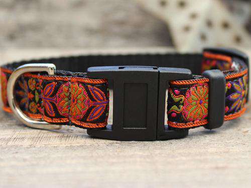 This is the Venice Cat Collars by Surf Cat. It's design is inspired by Italian Renaissance tapestries. This particular design is called Ink. The collar is made with breakaway buckles that pop apart under eight pounds of pull-pressure. This protects against choking hazards. It's made of soft and comfortable nylon overlaid with durable polyester ribbon. The collar is quintuple stitched at stress points for added strength. The fabric and stitching ensure the collar retains its shape comfort bad behavior.
