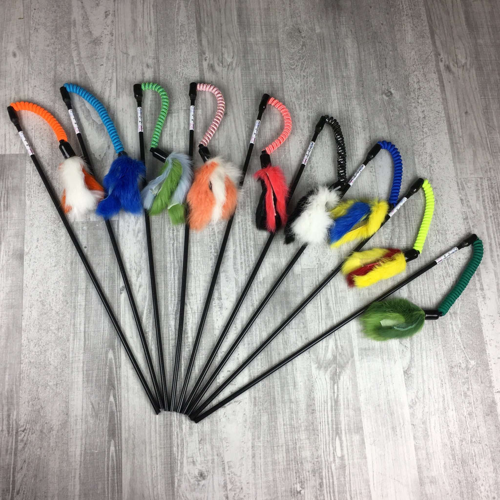 There are an assortment of Jumping Rabbit Fur Teaser Wand Cat Toys. The wands are designed to engage the cat's hunting behaviors. The rabbit fur attachments come in assorted color ways. 
