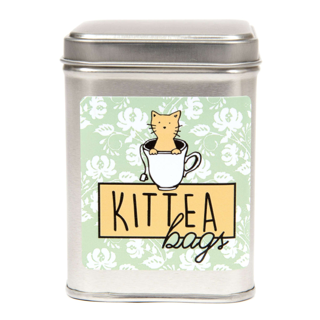 This is the tin can where for KitTea Liquid Catnip Cat Toy by Pet Winery.  On the tin can's front, there is a sticker. The sticker comprises of a floral background, a white tea cup with a cat in it, and below that, the KitTEA logo is. The sticker reads KitTEA bags. The tea bags have a blend of catnip, Valerian Root, and other herbs. They can be brewed for the cat to drink. It is safe for all cats. 