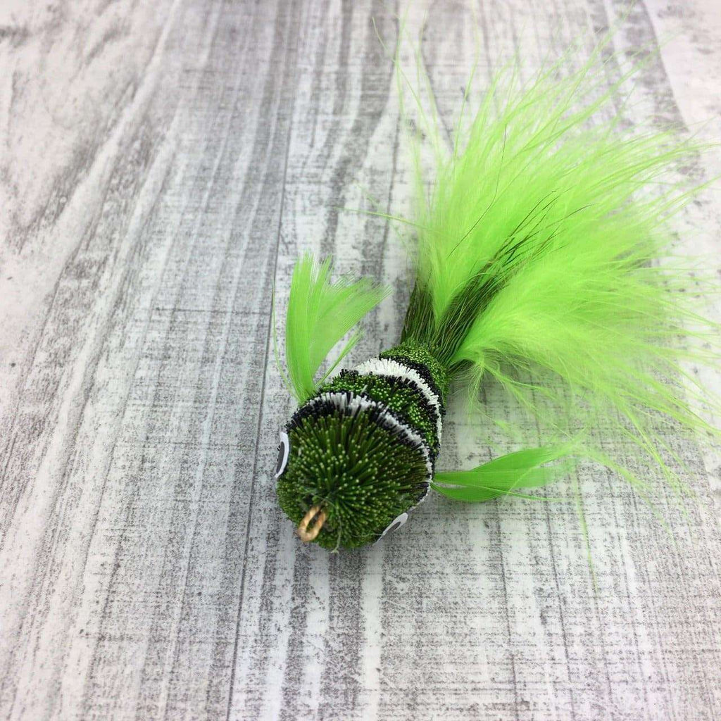 This is a Pretty Fly Clownfish Teaser Wand Cat Toy Replacement Lure by Catboutique. It is neon green.  The fish has black and white stripes. There is a feather tail. The lure is made of deer hair and is dyed a dye that isn't harmful to cats. This lure is meant to engage at the cat's hunting instincts like prowling, pawing, and pouncing.
