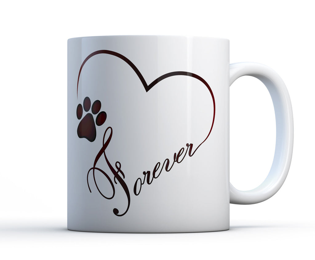 Best gift for dog lovers. A sentimental and unique ceramic mug with artwork of a paw print, a heart and the word forever.
