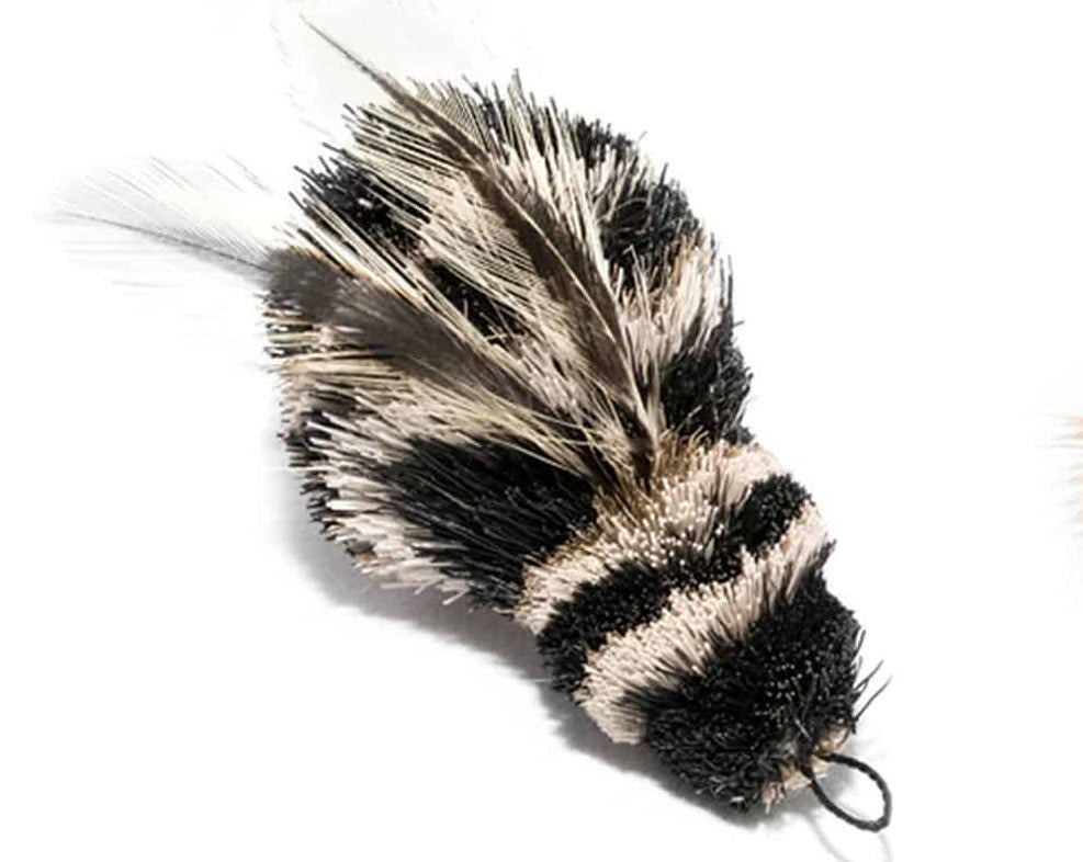 This is a Da Queen Bee™ Teaser Wand Cat Toy Replacement Lure by Go Cat. The bee has a black and white striped body. It has a cotter clip ring at the head of the body. The insect has black and white wings. The lure works best with a Go Cat Teaser Wand Cat Toy. 