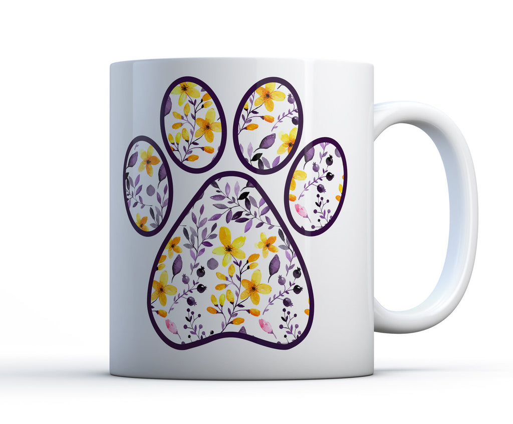 11oz mug with yellow and white floral paw design. 